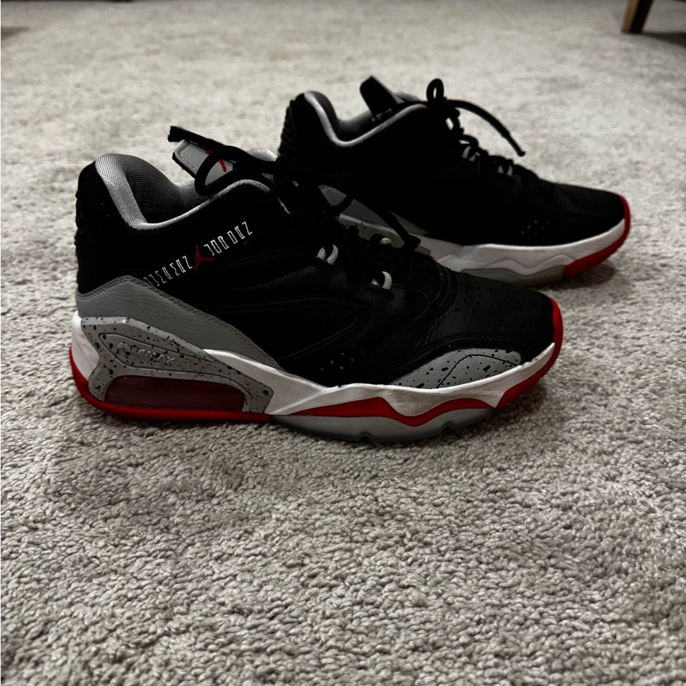 Men's Black and Red Jordans size 8